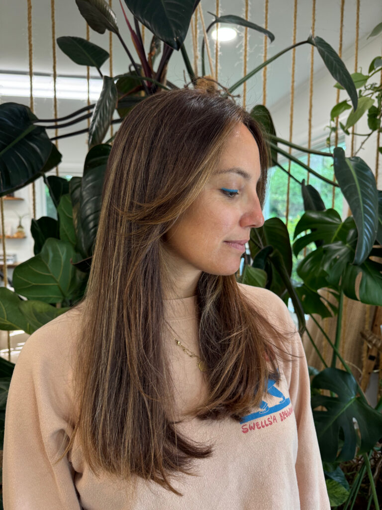 Long face-framing brunette